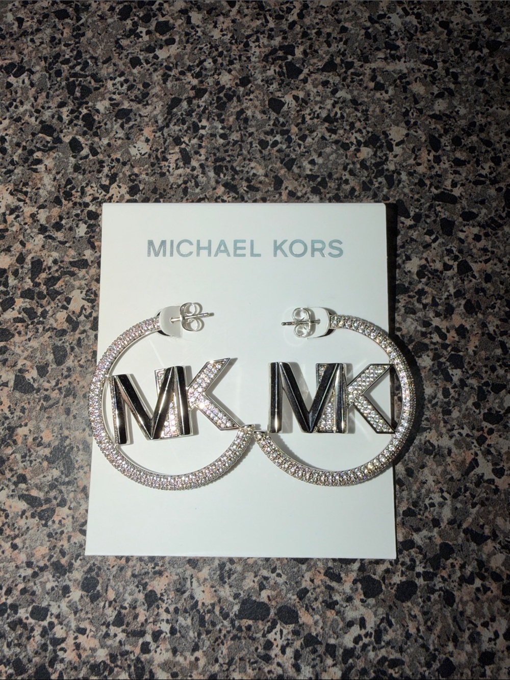 Michael Kors Silver Tone MK Logo
Pavé Hoop Earrings